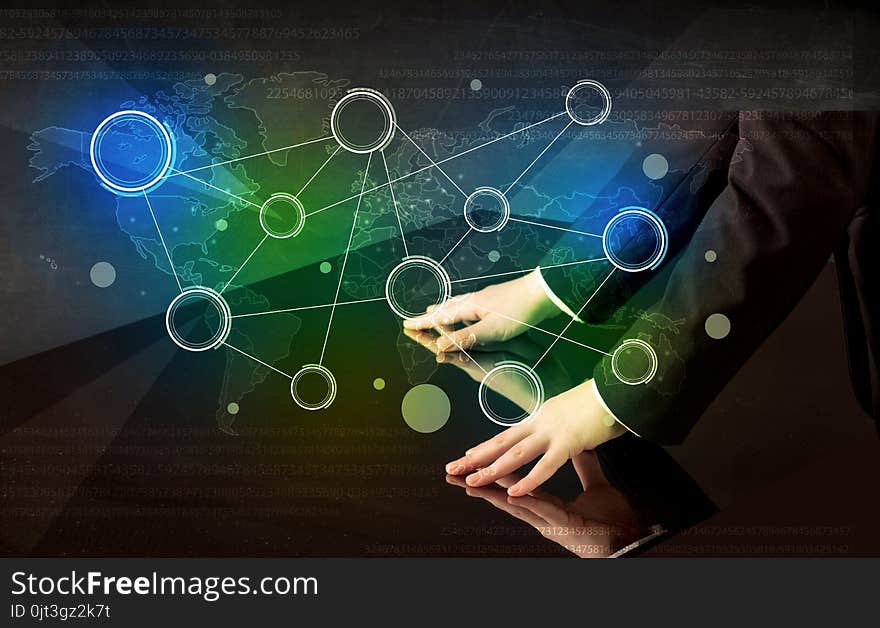 Hands touching interactive table