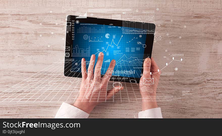 Business hands holding tablet