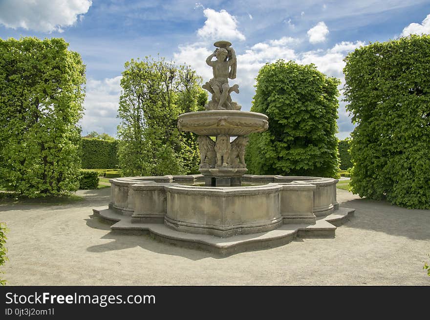 Flower gardens in french style and lion fountain in Kromeriz, Czech republic, Europe