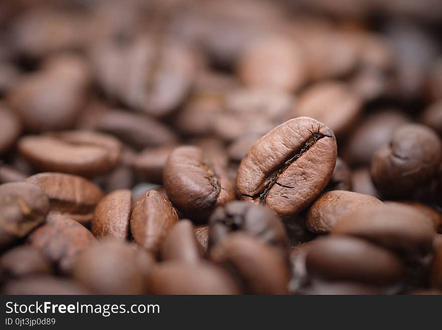 Close up - roasted coffee beans as a background composition, can be used as a background.