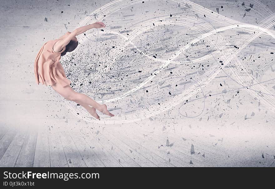 Performance ballet dancer jumping with energy explosion grungy particles concept on background. Performance ballet dancer jumping with energy explosion grungy particles concept on background