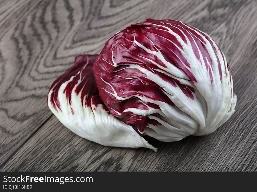 Fresh Radicchio salad on the wood background