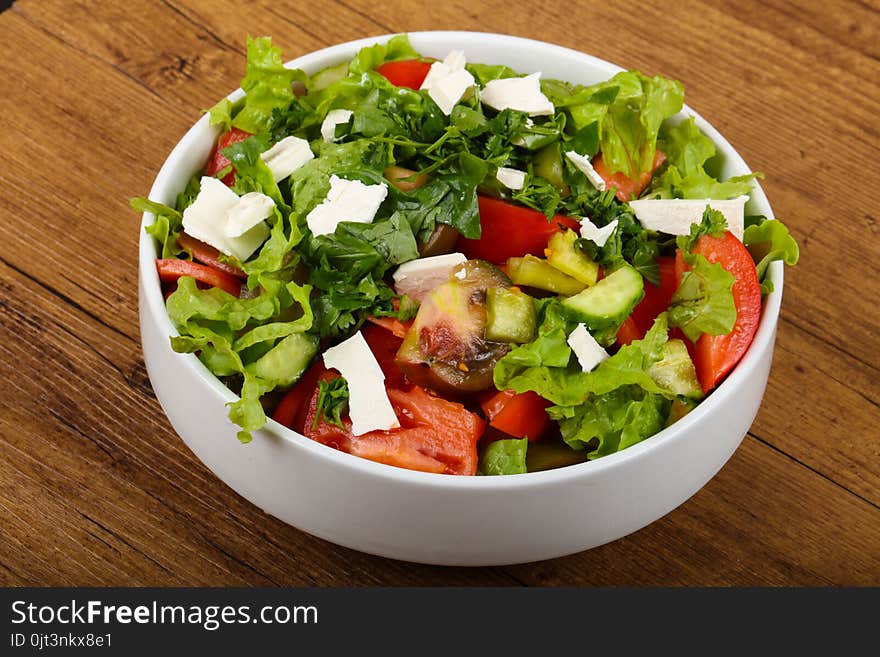 Greek salad with feta cheese and vegetables