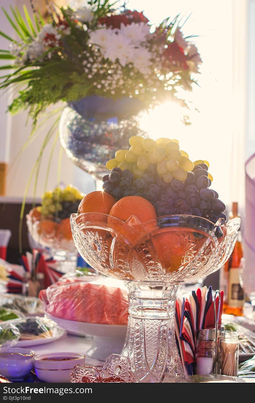 Fruits And Flower Bouquet In Glass Vases