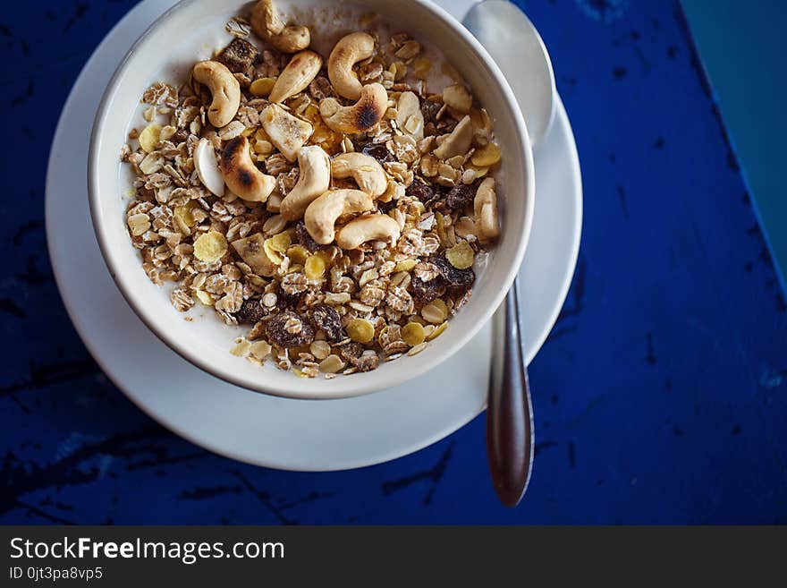 Muesli and nuts in yogurt in a plate