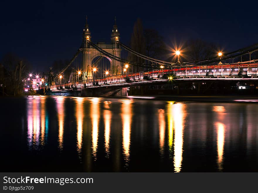 Spectacular British architecture of famous Hammersmith Bridge Thames River at night Capital of England London Europe. Spectacular British architecture of famous Hammersmith Bridge Thames River at night Capital of England London Europe