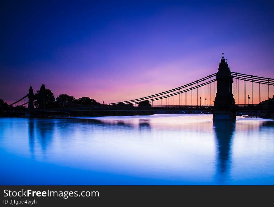 Spectacular British architecture of famous Hammersmith Bridge colorful sunset Capital of England London Europe. Spectacular British architecture of famous Hammersmith Bridge colorful sunset Capital of England London Europe