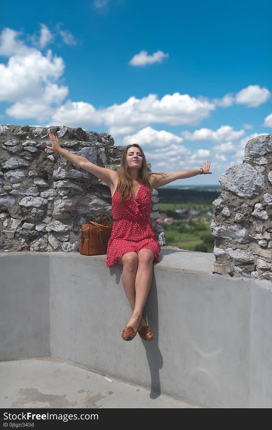 Happy girl in red dress