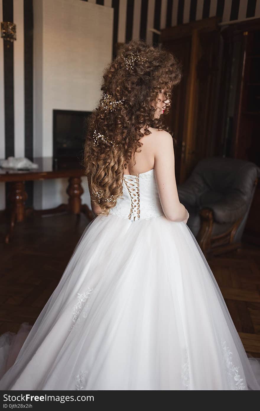 Hairstyle of a young beautiful bride