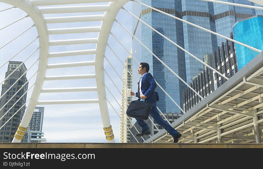 Business Man Run With Laptop Briefcase At Pedestrian