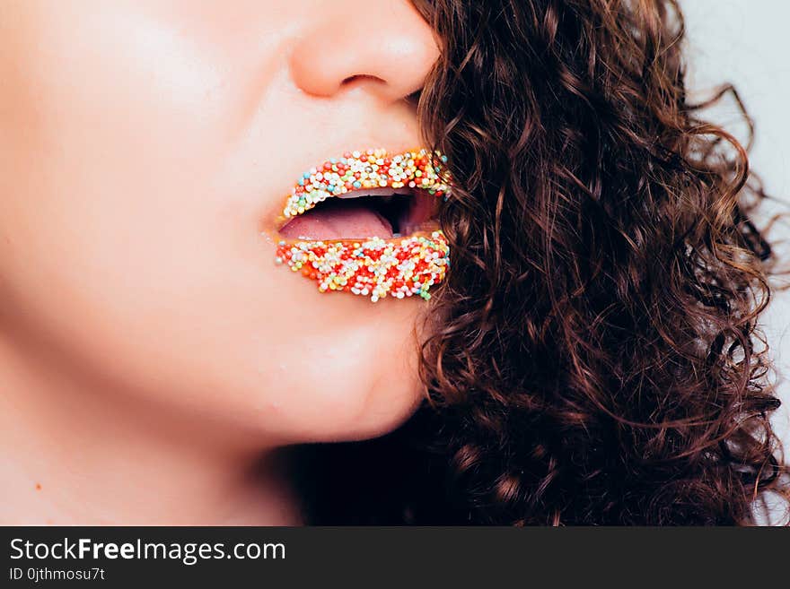 Woman With Sprinkle On Lips