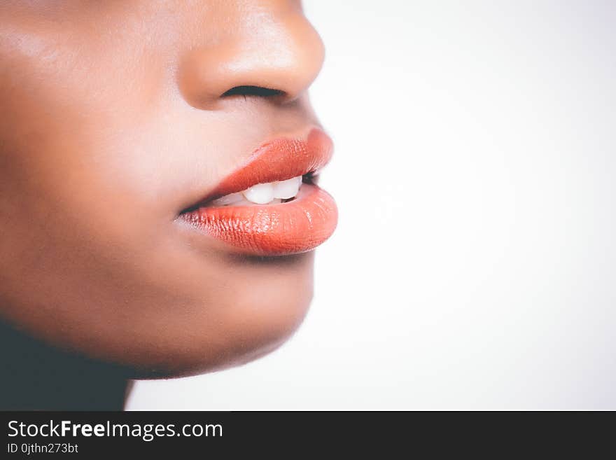 Woman Wearing Orange Lipstick