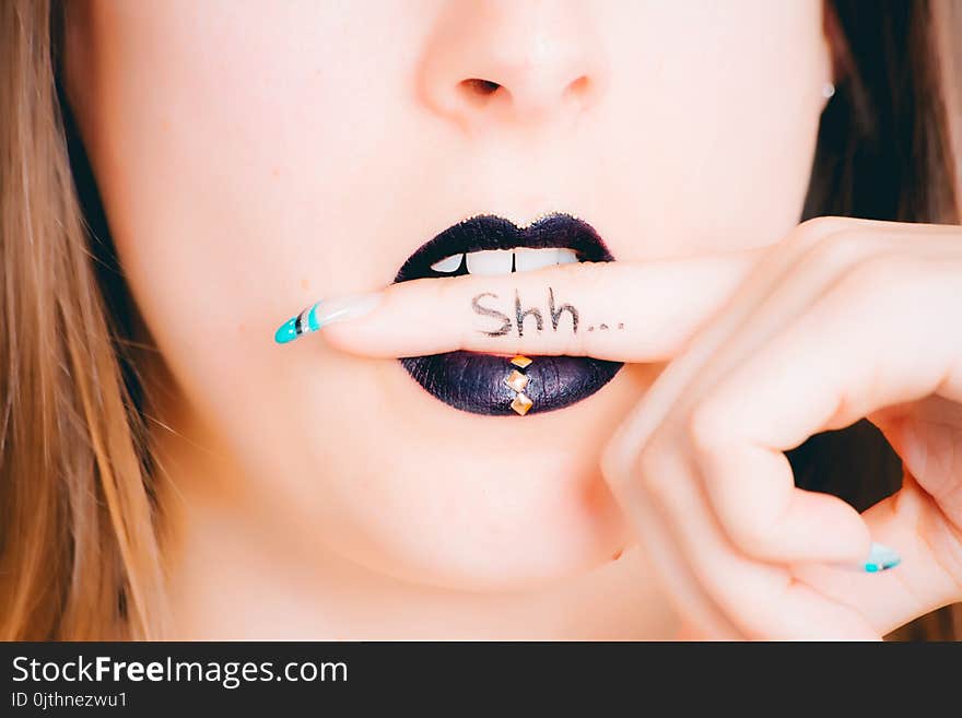 Woman Wearing Purple Lipstick