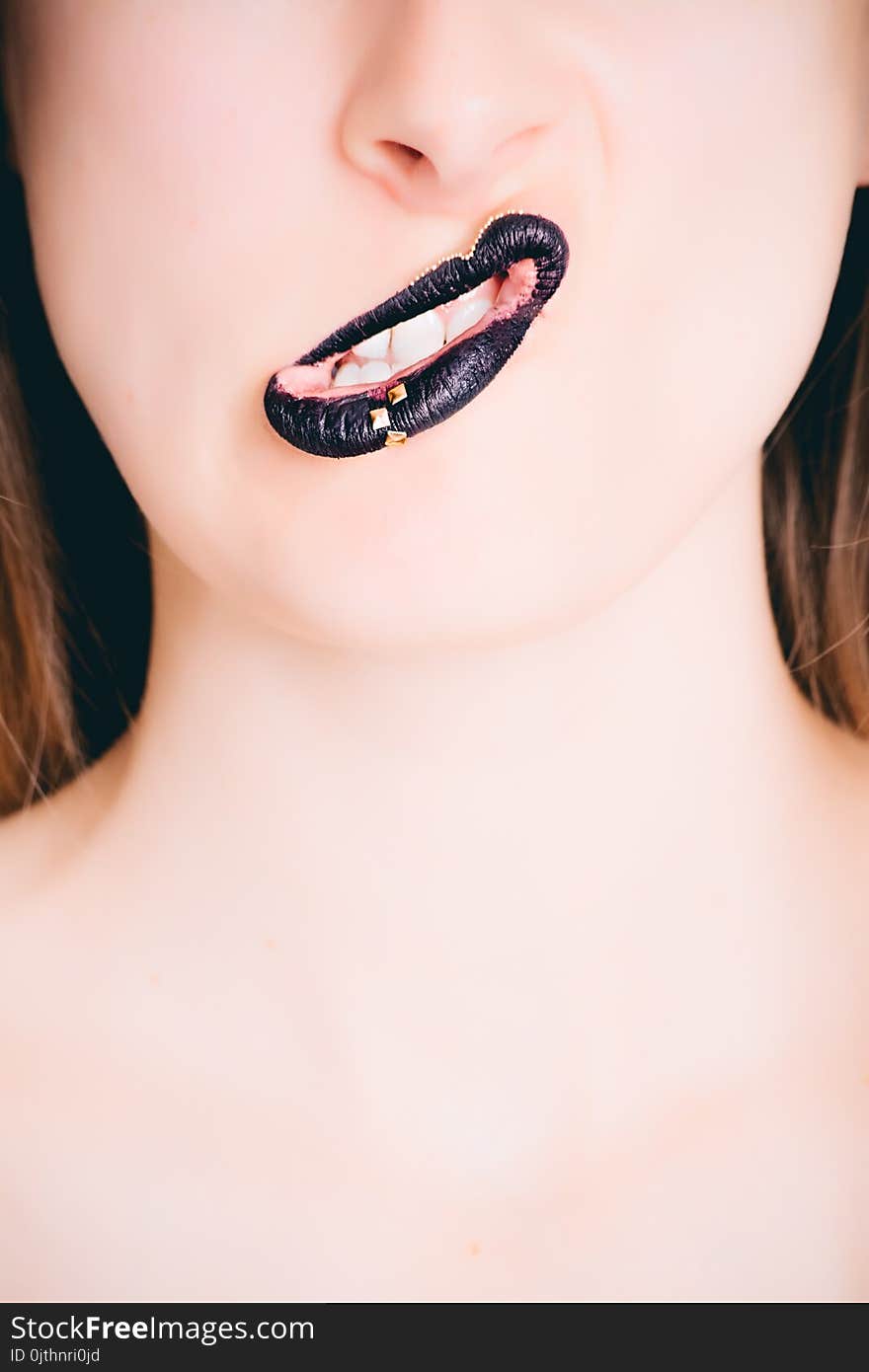 Woman&#x27;s Black Lipstick