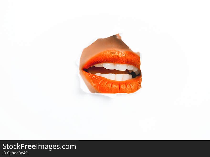 Photography of Woman&#x27;s Orange Lip