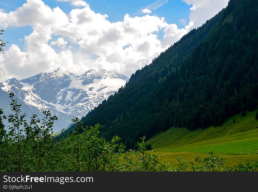 Green Mountain Under Cloudy Sky