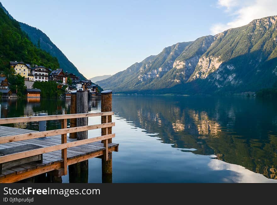 Green Mountain Surrounded by Body of the Water