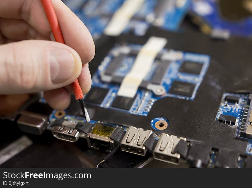 Computer Repair Close-up. Service Center Of Laptops And Electronics. Fix A Broken Laptop.