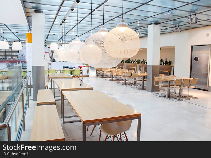 Interior of a light cafe in Europe. A modern cafe, restaurant or snack bar. Interior of the restaurant.