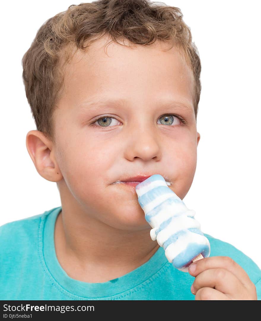 Boy eating ice cream on a white background .