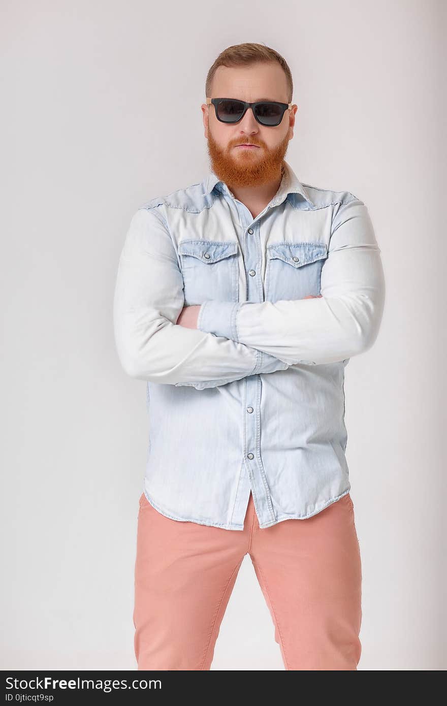 Beard Man In Sunglasses And Denim Shirt