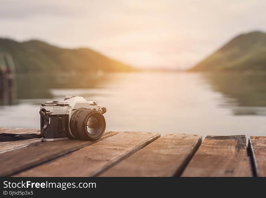 Retro camera with beautiful landscape