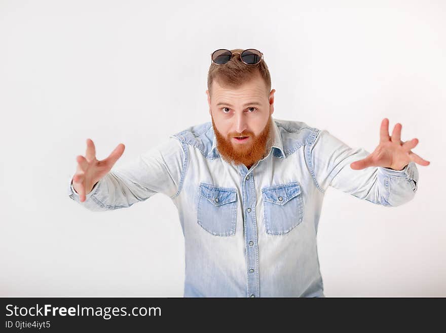 Beard man in sunglasses and denim shirt