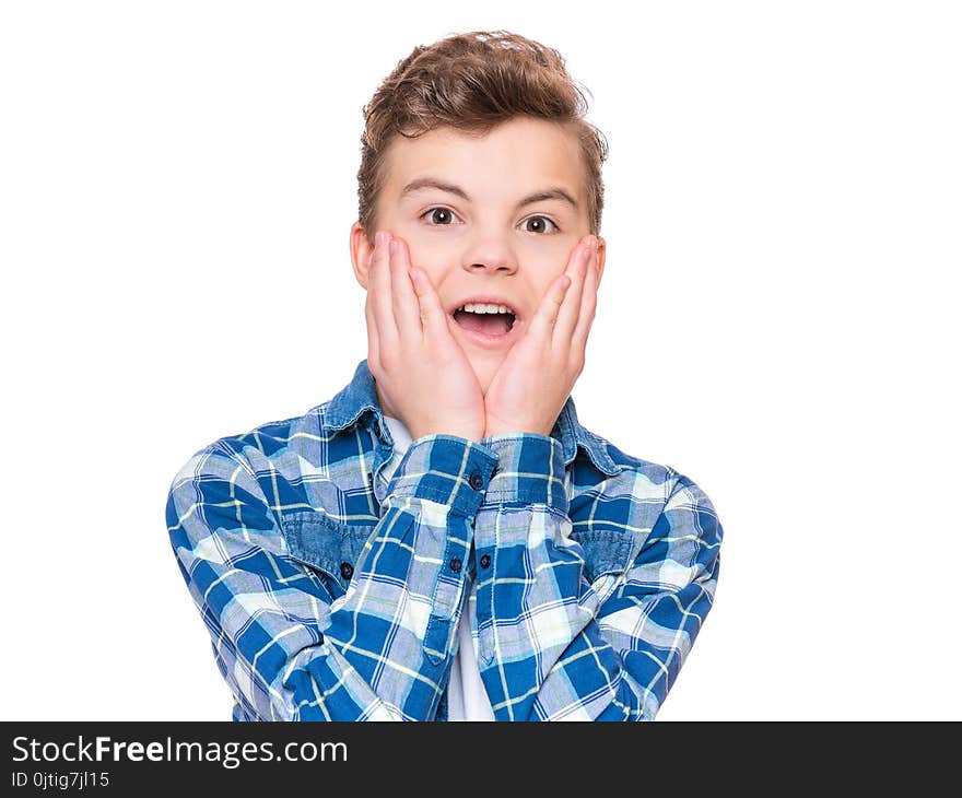 Emotional portrait of caucasian teen boy - surprised teenager looking at camera. Handsome child, isolated on white background. Emotional portrait of caucasian teen boy - surprised teenager looking at camera. Handsome child, isolated on white background.