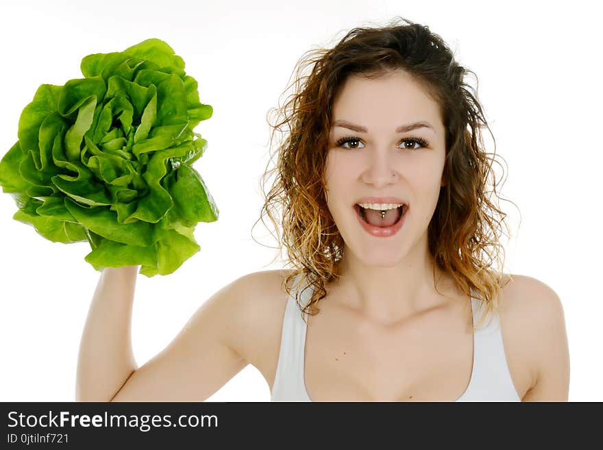 Curly hair girl holding lettuce