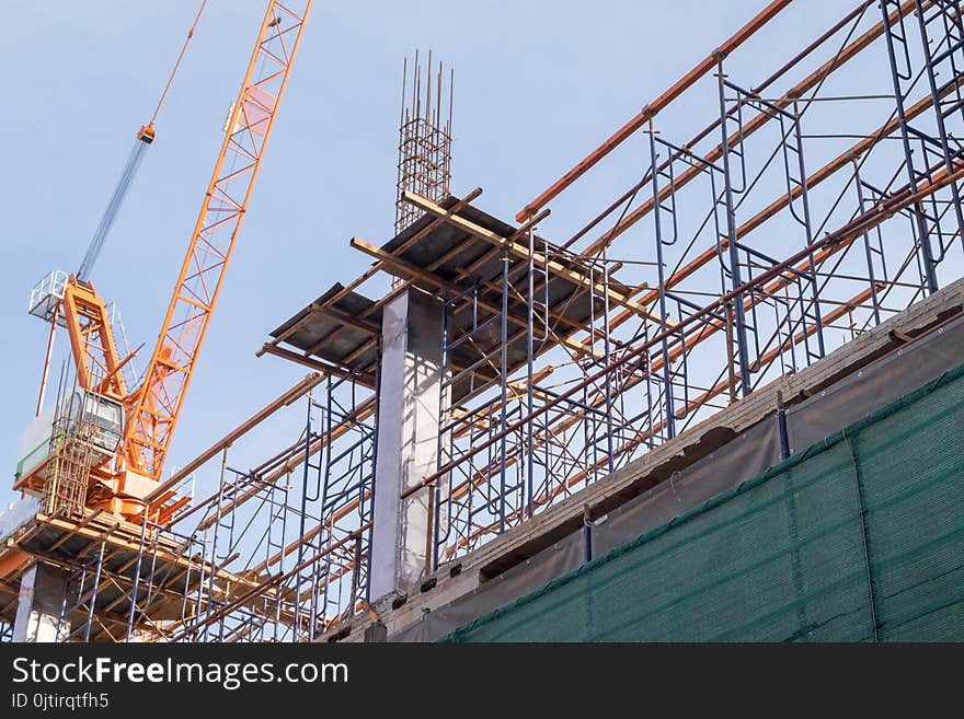 Construction Site With Steel And Concrete Pillars Are Molded Into The Structure Of The Building