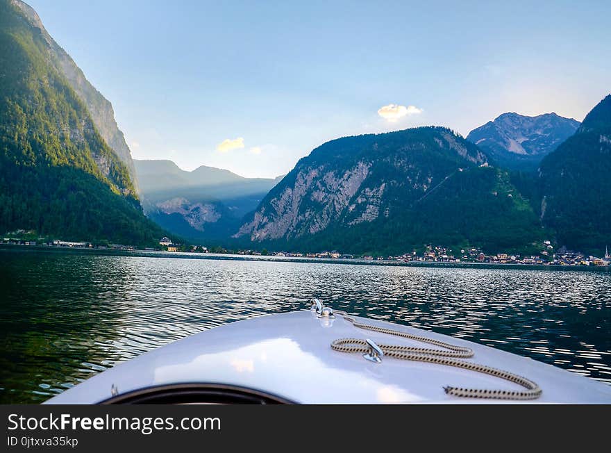 Landscape Photo Of Mountains Near Body Of Water