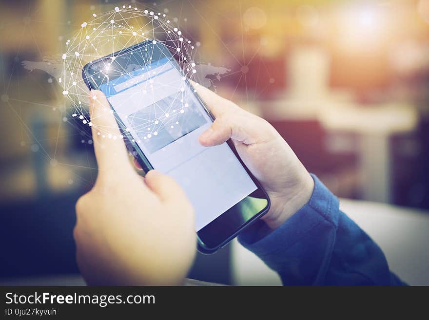 Business people hands holding smartphone with smart connection technology icons. Online business or E-commerce.