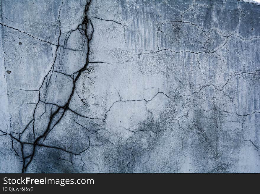 Cracked plaster looks decorative on the brick wall giving a beautiful look. Cracked plaster looks decorative on the brick wall giving a beautiful look