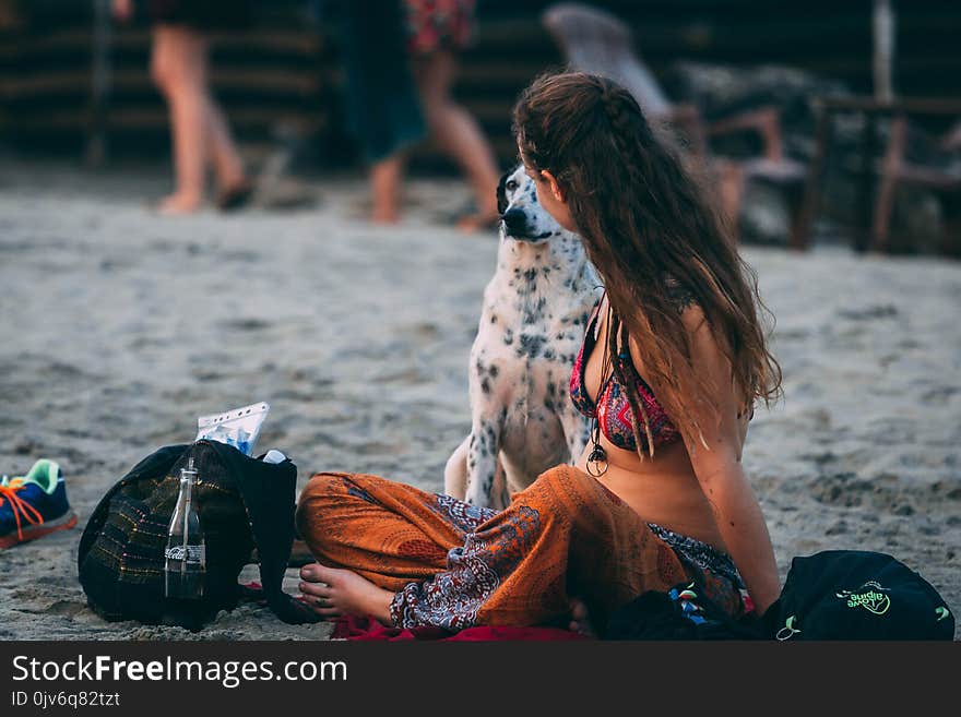 Woman Wearing Pink and Black Swimtop