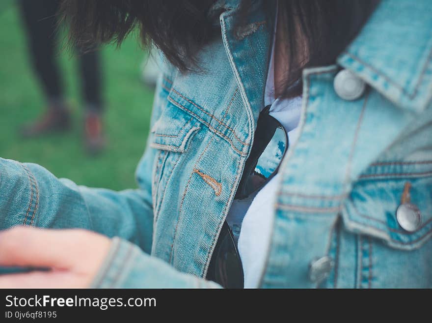 Woman Wearing Gray Denim Jacket