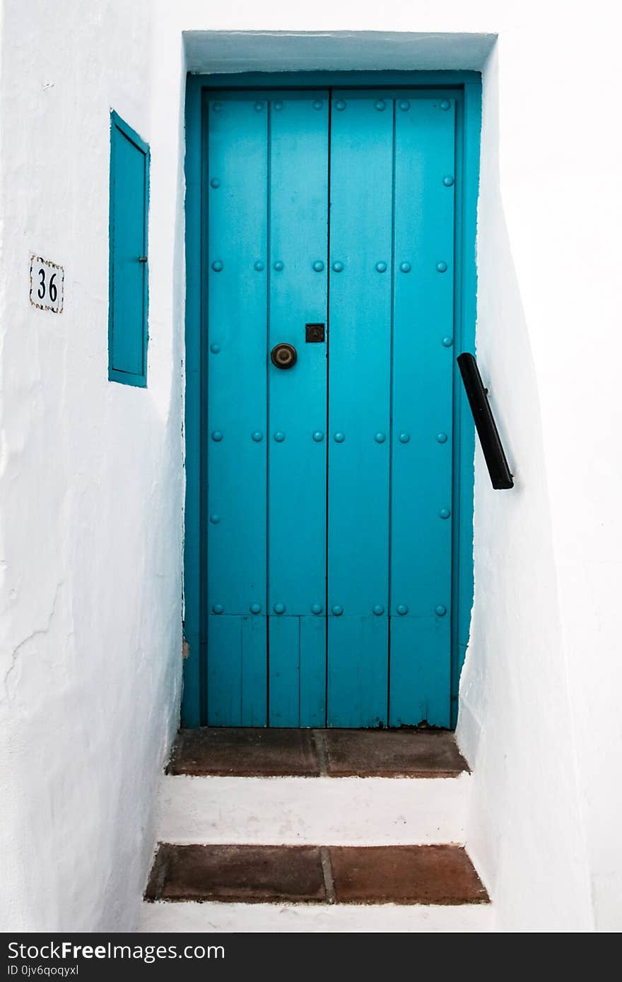 Closed Blue Wooden Door