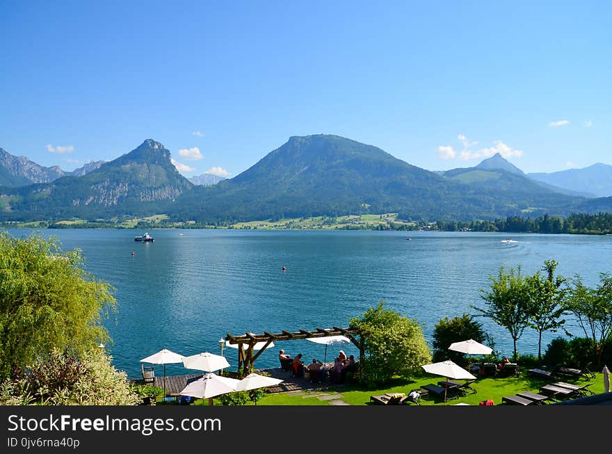 Lake and Mountain Under Blue Sky and White Clouds View Aerial Photography