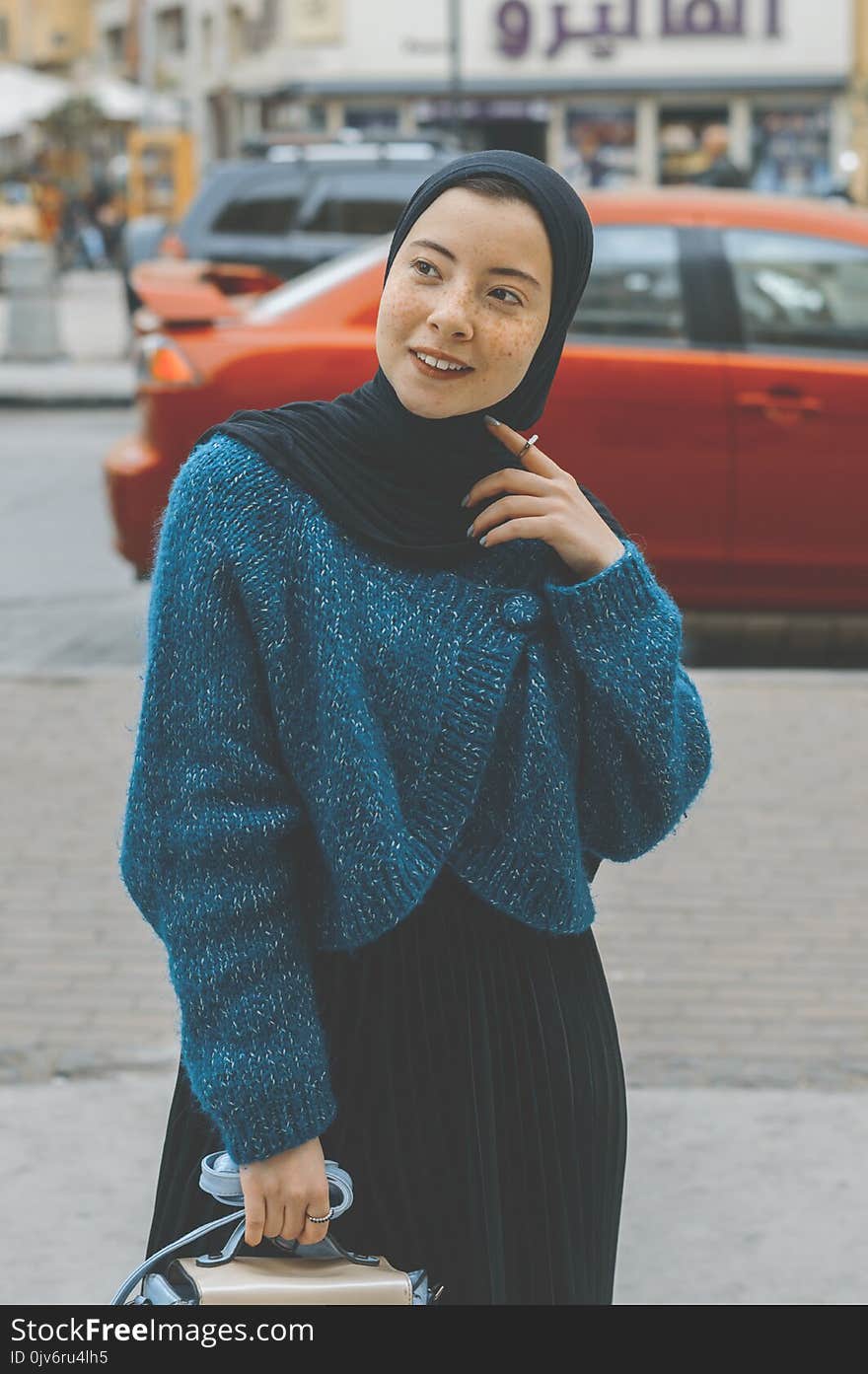 Woman in Blue Sweater With Black Hijab Outfit