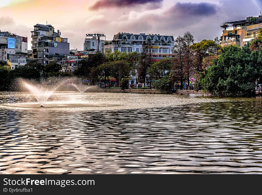 Outdoor Fountain Near Buildings