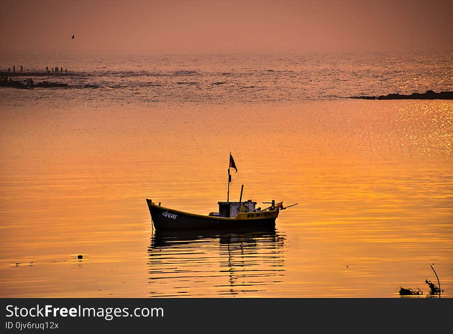 Black Sail Ship on Body of Water