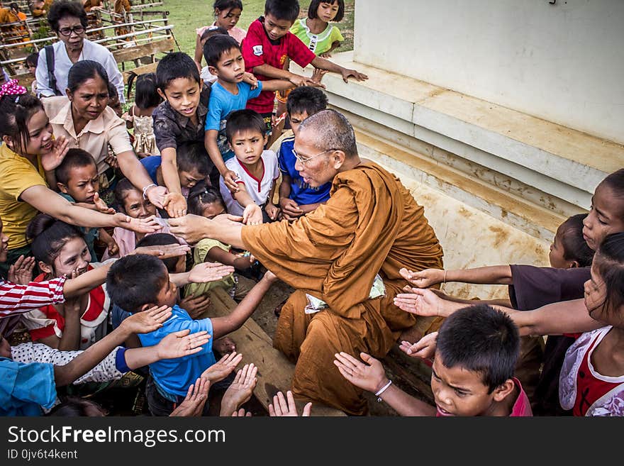 Monk Surrounded by Children