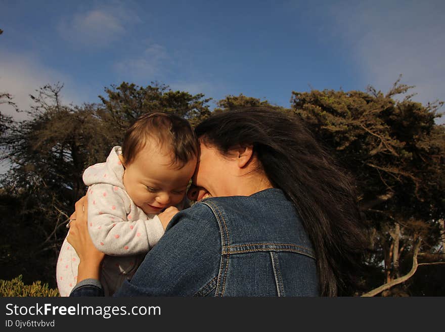 Mother And Child On A Beach