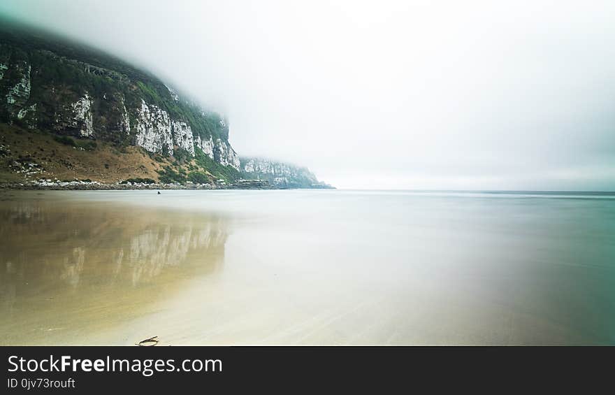 Dramatic beginning to a nice and warm misty afternoon on the south beach of New Zealand. Dramatic beginning to a nice and warm misty afternoon on the south beach of New Zealand