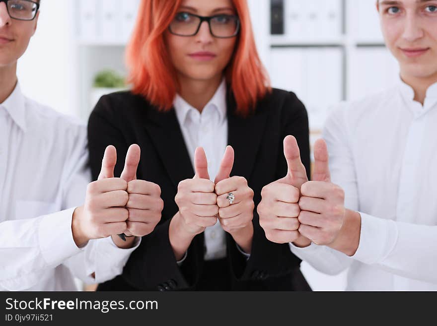 Group of people show ok or confirm with thumb up during conference closeup. High level quality product serious offer excellent education mediation solution creative advisor participation concept