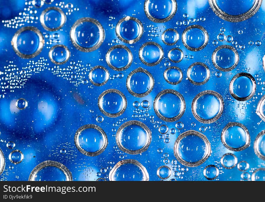 Drops of water on a blue background