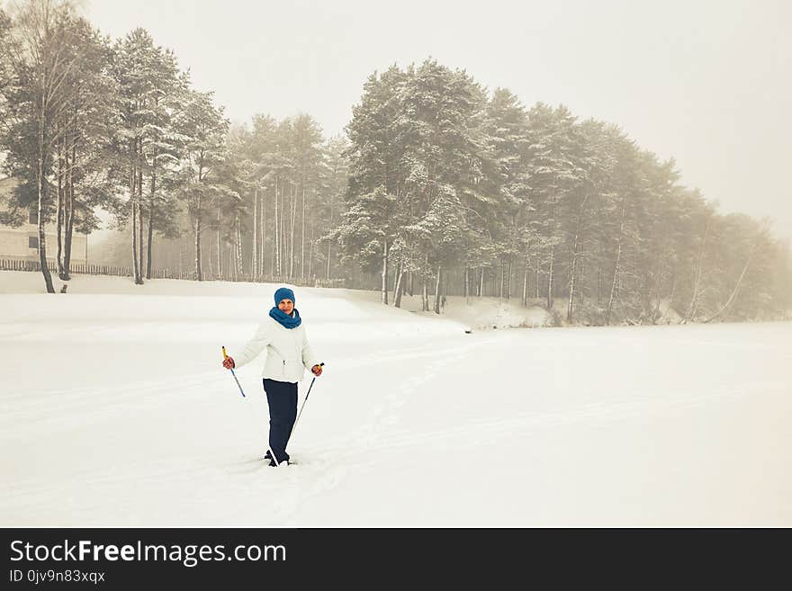 Belarus, Grodno, Lake Molochnoe in the winter. People skiing.