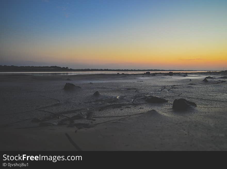 Sea Shore Under Sunset