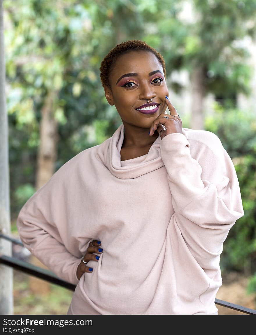 Woman Wearing Brown Sweater