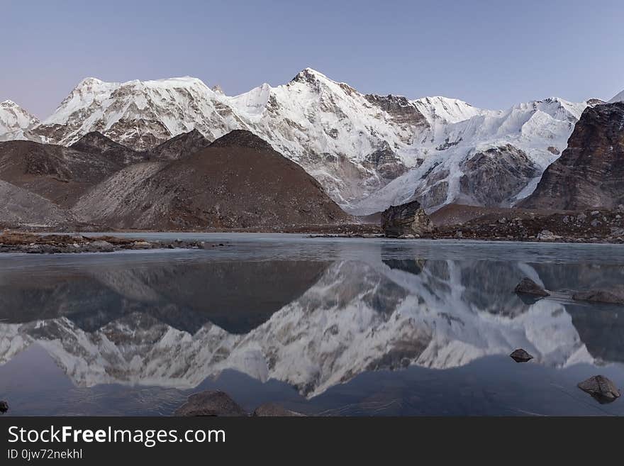 Beautiful mountain Cho Oyu reflecting in the gray.