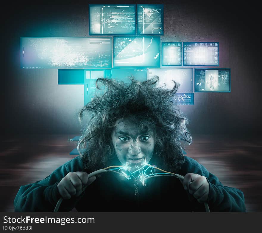 Young girl with messy hair being shocked by electric cable, in a office with digital screens. Young girl with messy hair being shocked by electric cable, in a office with digital screens.